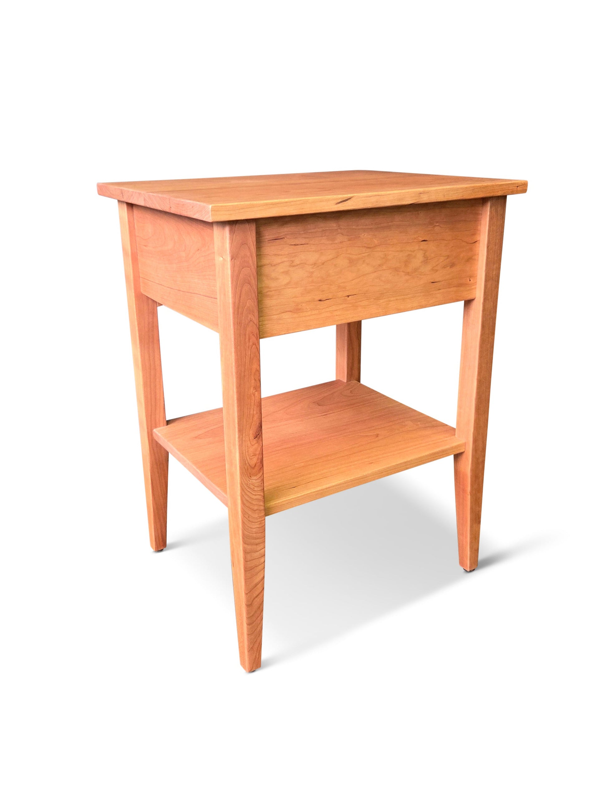 Wooden side table with a shelf on a white background